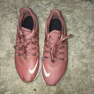 Women’s pink nike running shoes